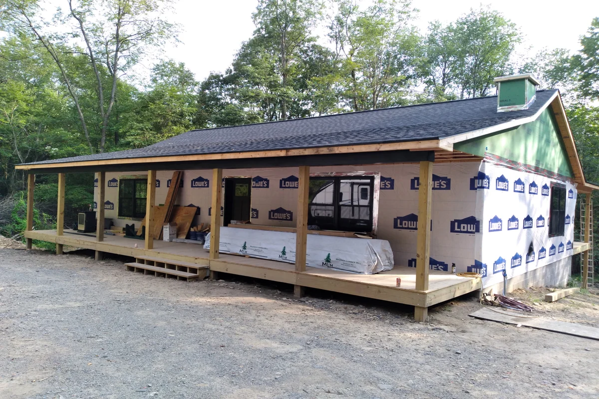 Before: Original cabin exterior prior to remodel