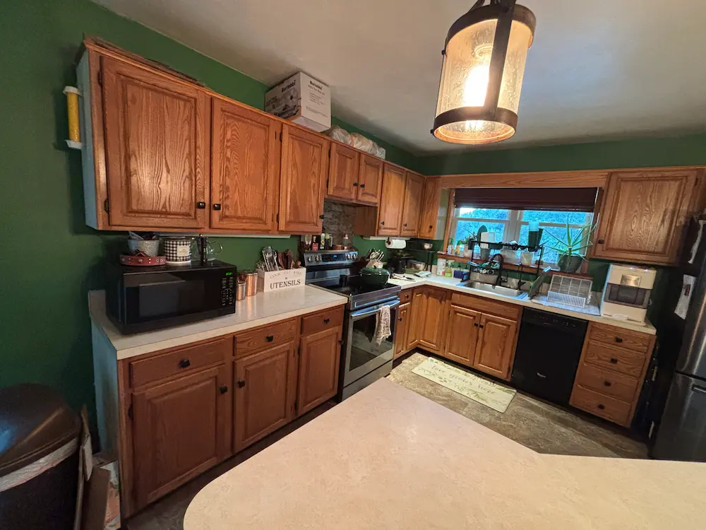 Before: Original kitchen layout before remodel