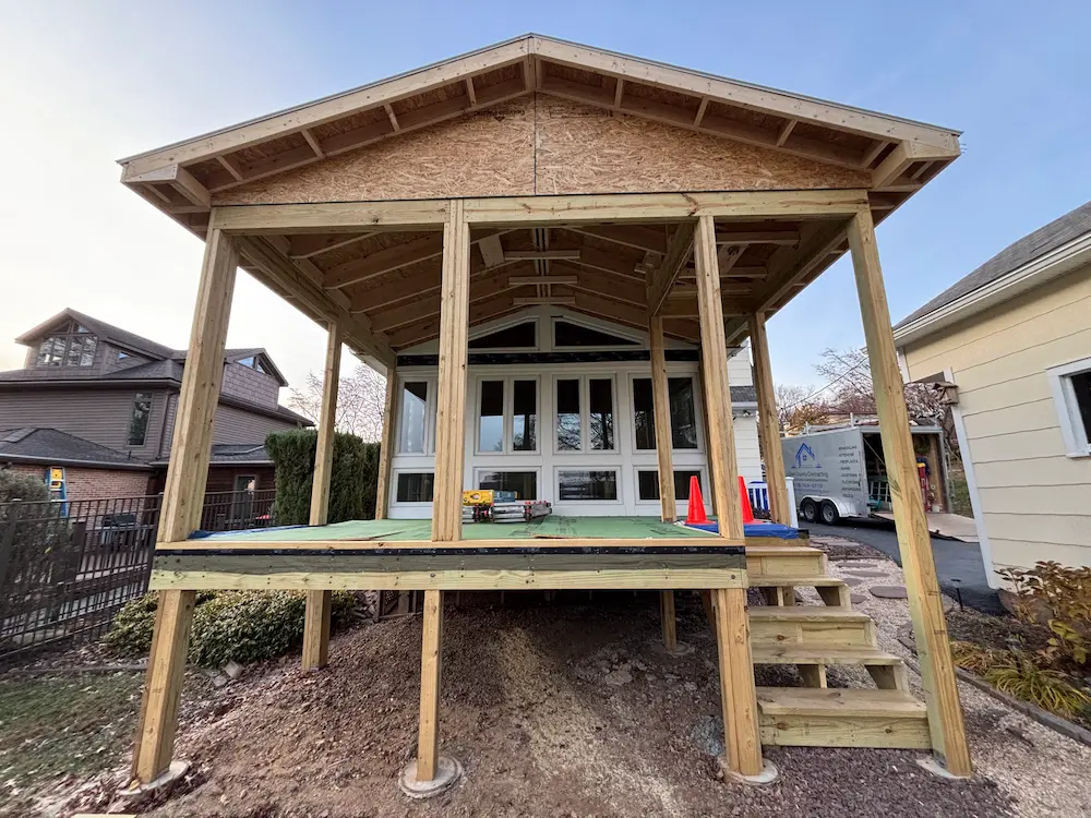 Before: Porch roof framing and structural supports